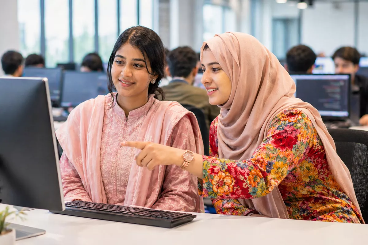 Students working together in a SuperTech computer lab